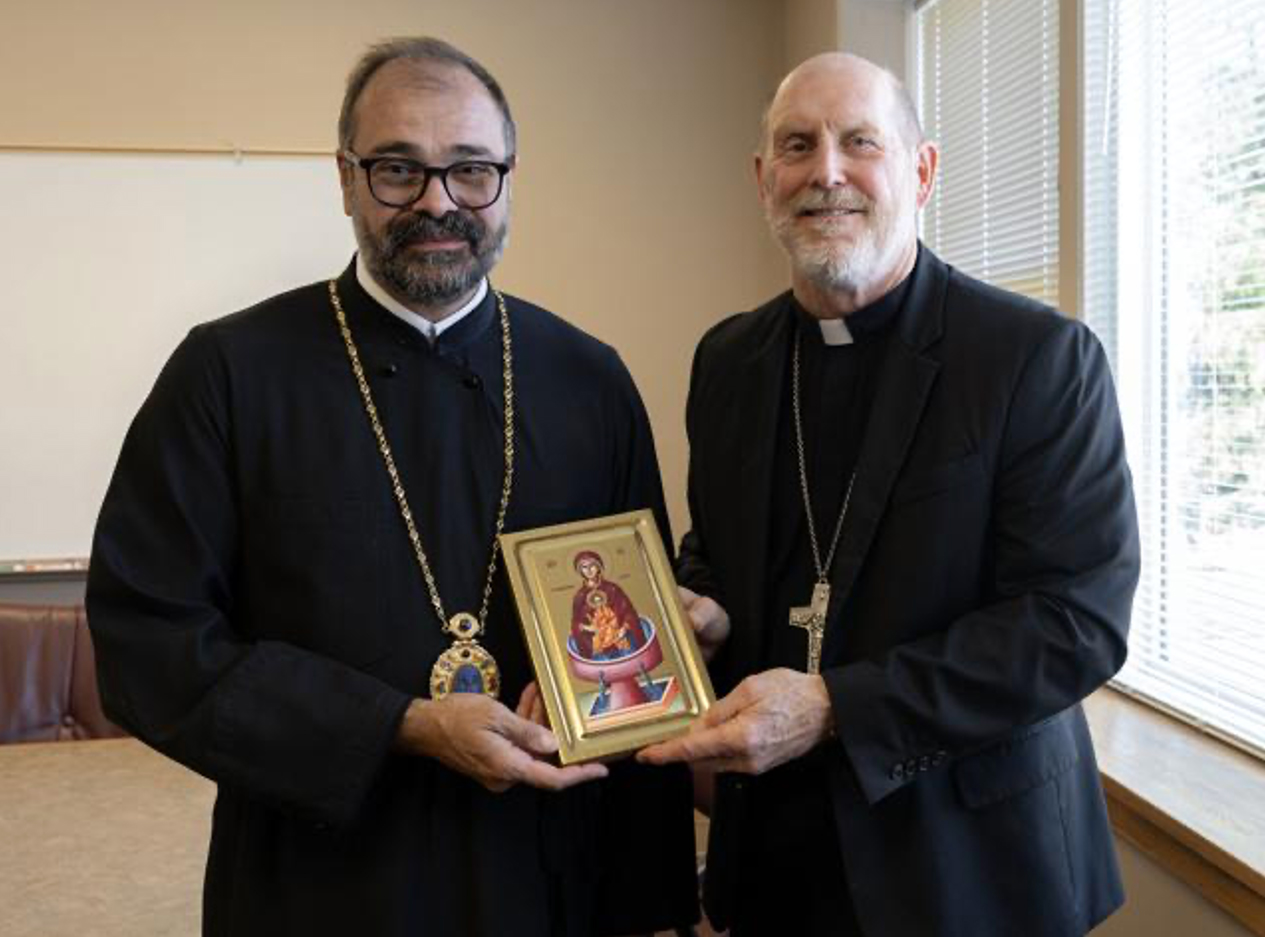 His Eminence Metropolitan Nathanael of Chicago (left) and Archbishop Thomas Zinkula meet at the Archdiocese of Dubuque office on Friday. Stephen Gassman, Telegraph Herald